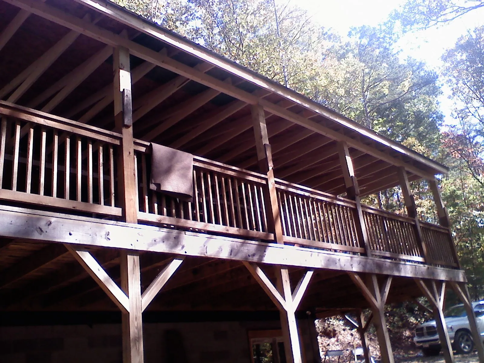 Timber framing under a new elevated porch and deck — Roof Leak Repair in Galesburg by Roofing Brothers